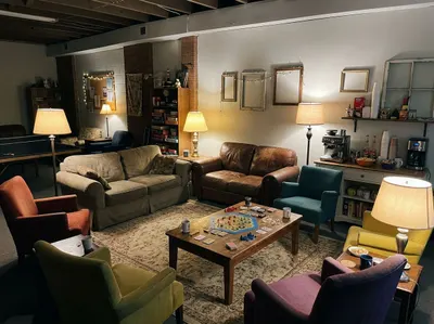 The youth room with couches, bean bags and a guitar